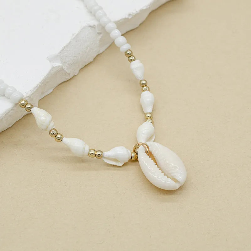 White conch shell necklace for women with electroplated finish and regular chain