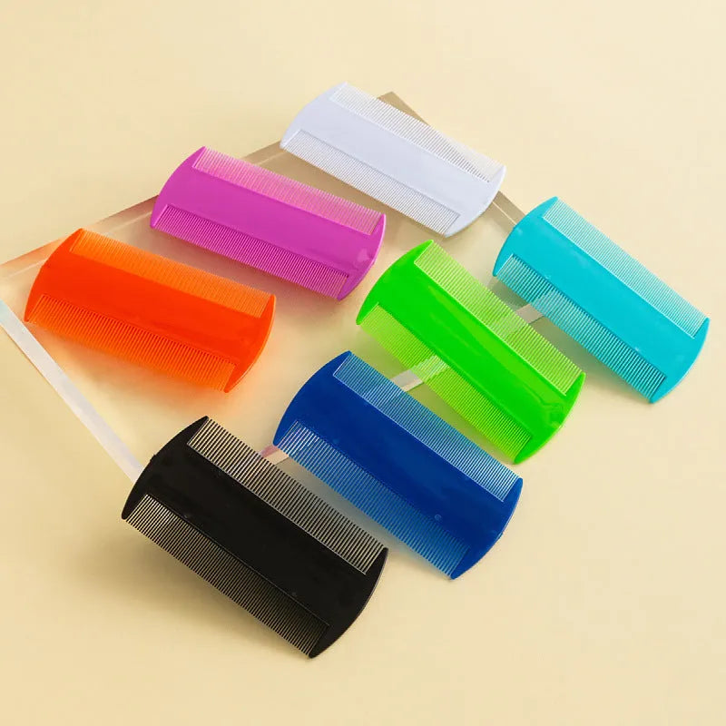 Double-edged fine-toothed plastic flea and lice comb in assorted colours on a white background.