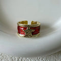 Geometric drop oil ring with distressed finish in adjustable copper construction