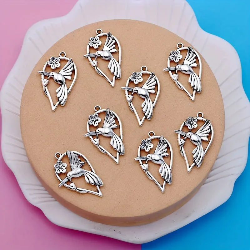 Alloy cuckoo bird pendant charm with electroplated gold tone finish for DIY jewellery making