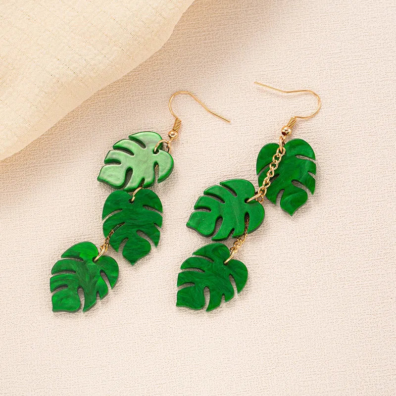 Acrylic drop earrings with coconut and jackfruit design on an alloy hook, shown in multiple colour styles.