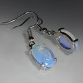 Retro moonstone opal earrings with cross design and drop-shaped elliptical pendants