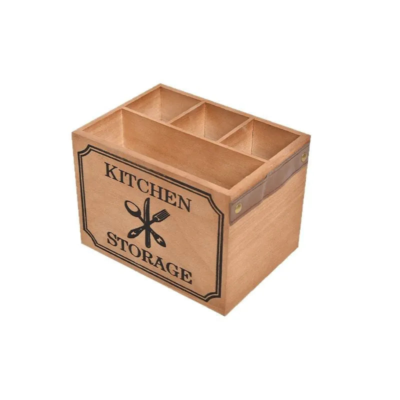 Natural wooden kitchen storage box with internal grid dividers for organising knives, forks, and chopsticks.