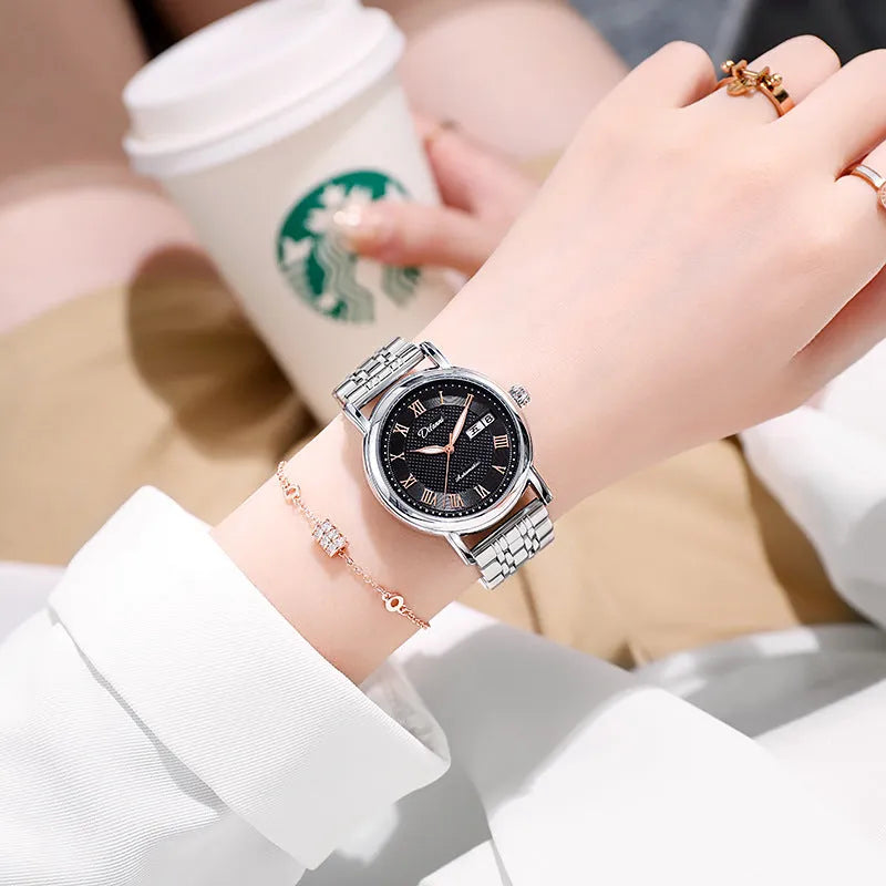 Women's automatic mechanical watch on wrist showing open case back with visible movement