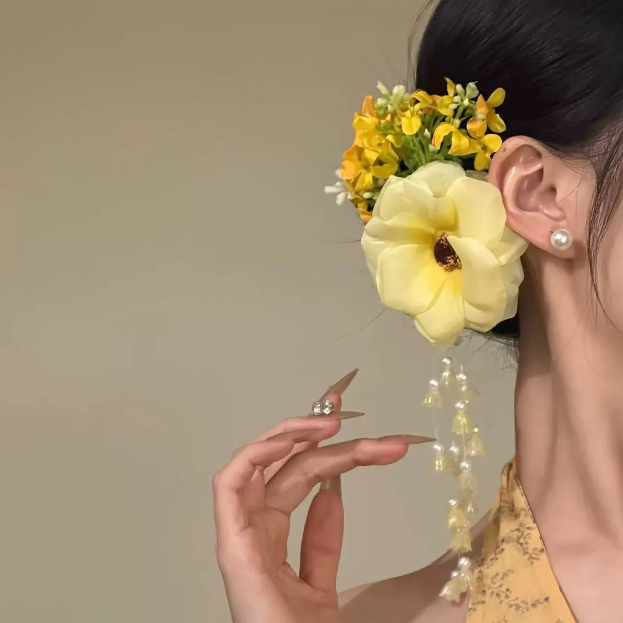 Yellow flower tassel hair clip side accessory with mixed material construction