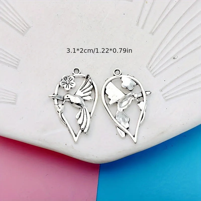 Alloy cuckoo bird pendant charm with electroplated gold tone finish for DIY jewellery making