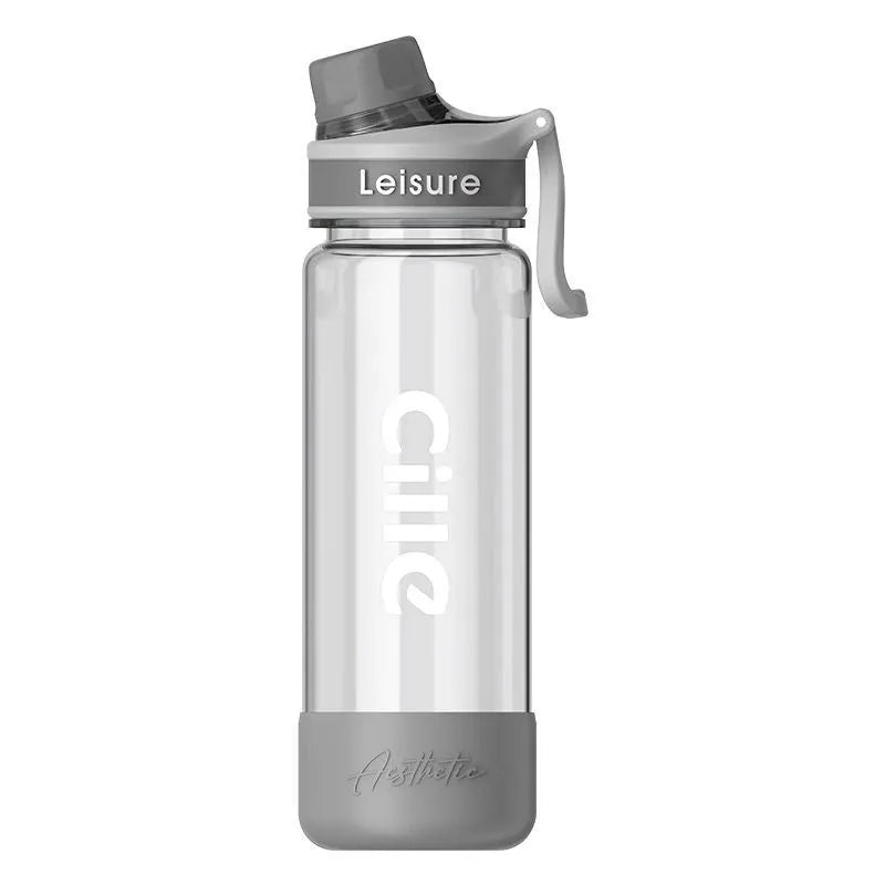 A grey heat-resistant plastic portable cup with a cylindrical shape on a plain background.