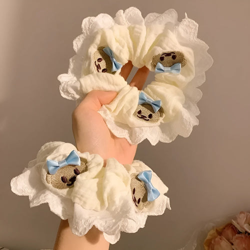 Bear blue bow lace large intestine hair ring on white background