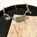 Dark style multi-layer cross necklace with twin chains and hemp flower links