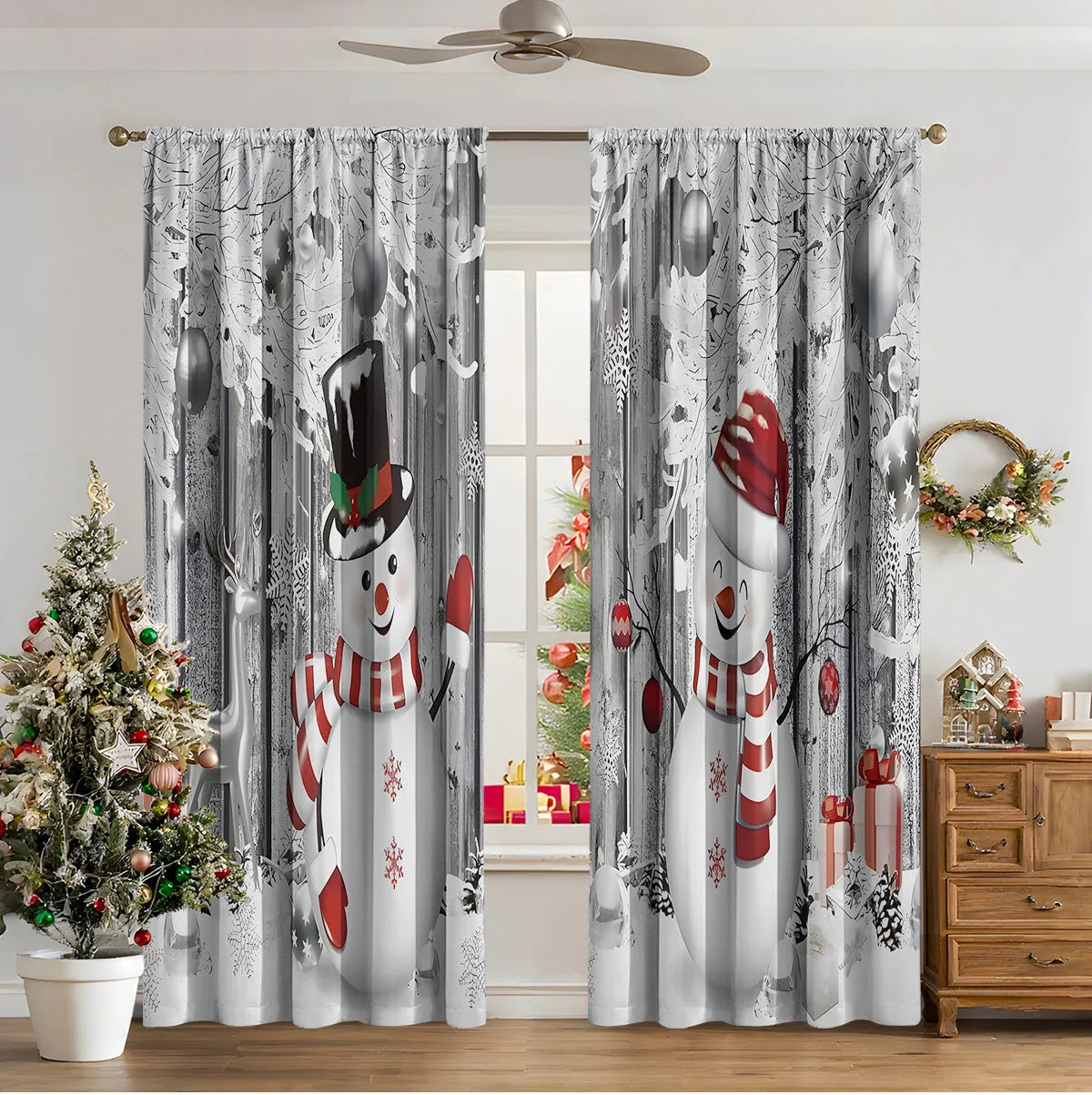 Set of two red and green 3D digitally printed Christmas theme curtains hanging on a window.