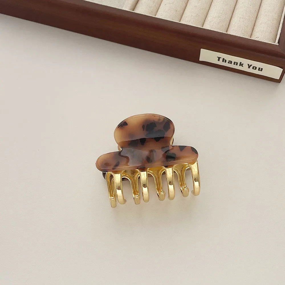 Women's retro acetate hair barrette with metal grip in leopard print colour option