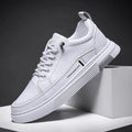 Men's white and black microfiber skate shoes with elastic band and rubber sole