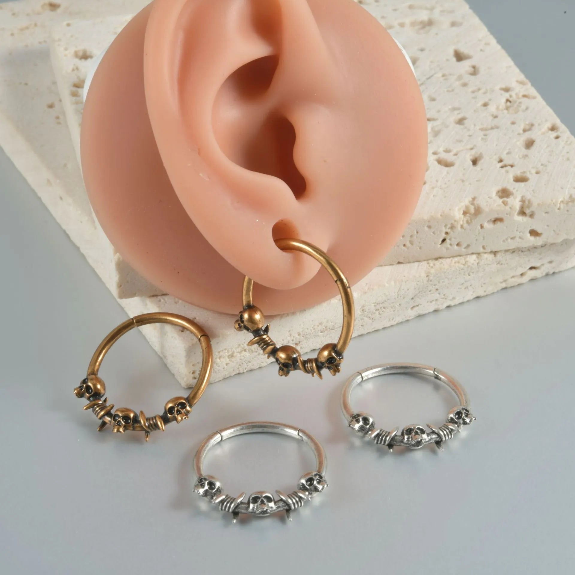 Vintage copper punk earrings with ghost head motifs in antique silver or gold finish