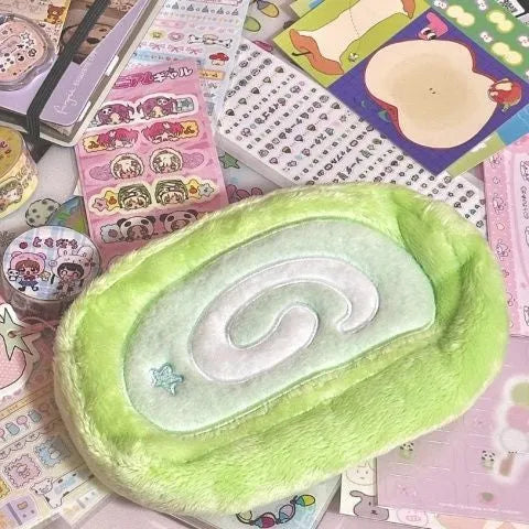 Velvet Swiss roll cake pencil case in Korean style with roll design for stationery storage