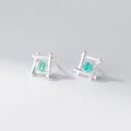 Geometric cross shaped stud earrings in sterling silver with angular design and gold or silver finish