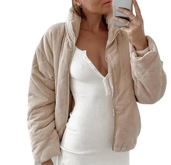 Apricot women's corduroy jacket with stand collar, long sleeves, and front zipper.