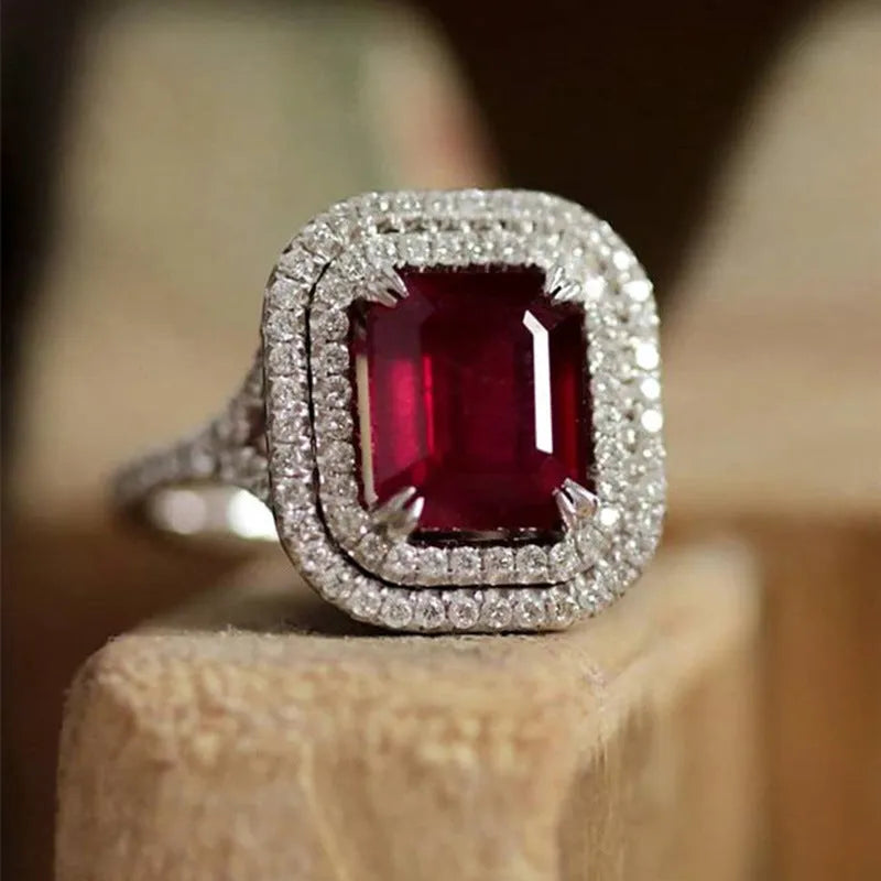 Women's copper square ring with red finish and princess-cut rhinestones on geometric band