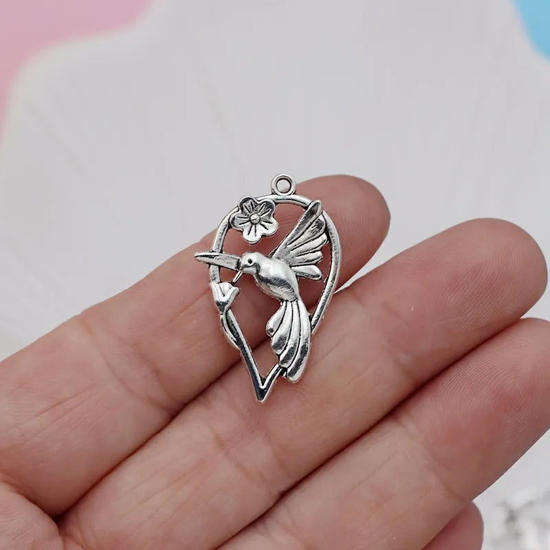 Alloy cuckoo bird pendant charm with electroplated gold tone finish for DIY jewellery making
