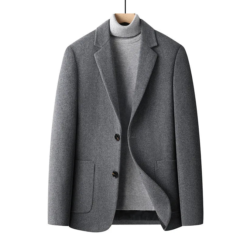 Men's slim fit wool suit jacket in grey, shown on a hanger, suitable for autumn and winter.