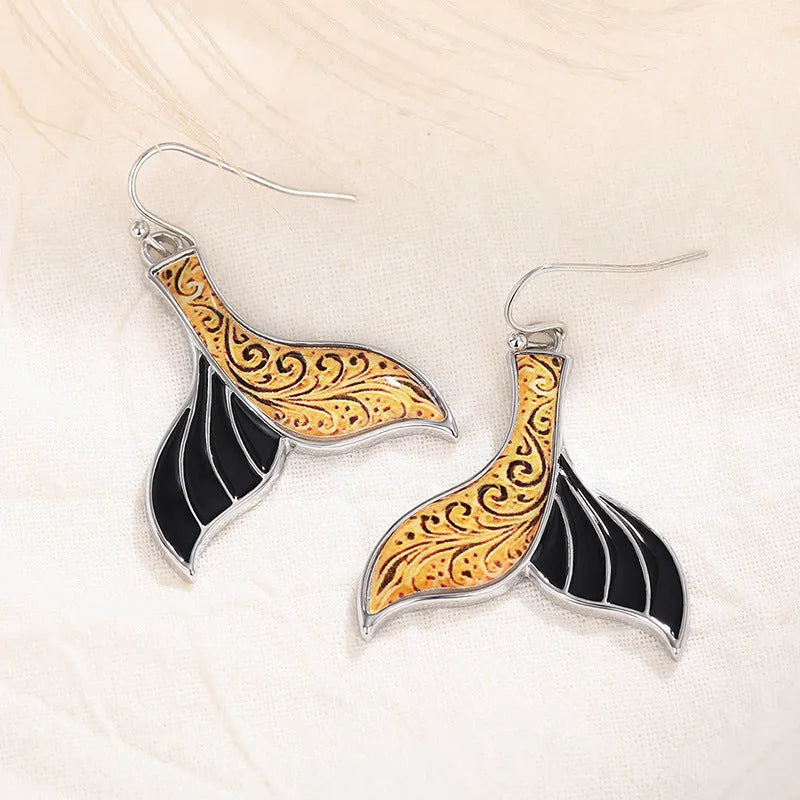 Women's fishtail earrings with retro whale design in white gold colour alloy metal
