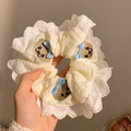 Bear blue bow lace large intestine hair ring on white background