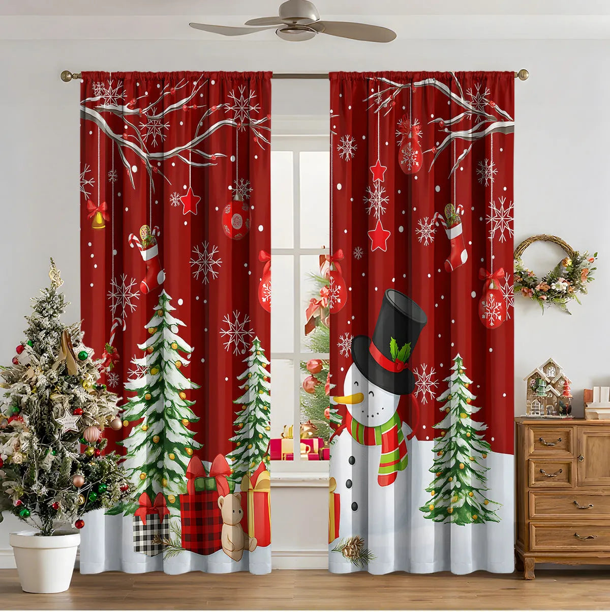 Set of two red and green 3D digitally printed Christmas theme curtains hanging on a window.
