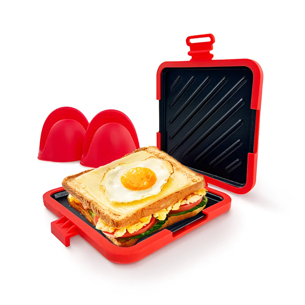 Red silicone baking tray and glove set in a handbag design on a kitchen counter