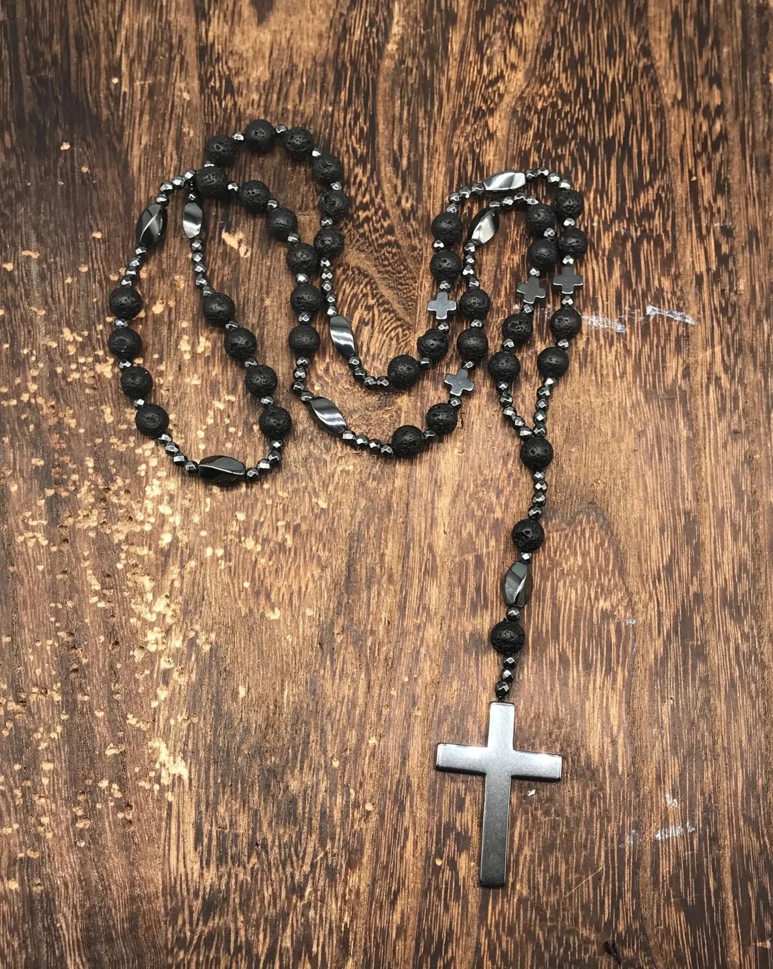 Men's stone cross pendant necklace on a ball bead chain with a safety lock clasp.