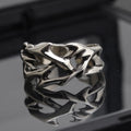 Adjustable copper ring with geometric thorn and flower design in J2150 thorns colour