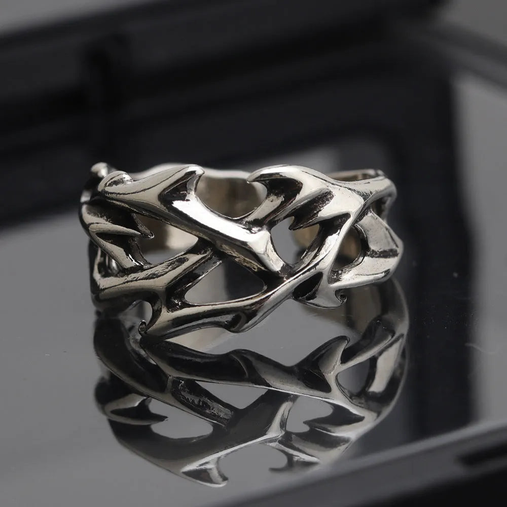 Adjustable copper ring with geometric thorn and flower design in J2150 thorns colour