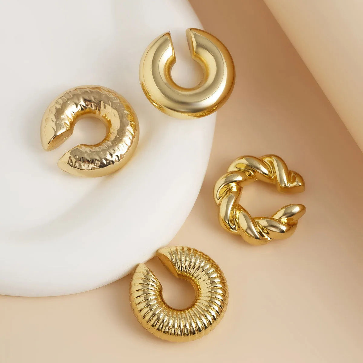 Gold geometric clip earrings set of four pieces for women without pierced ears