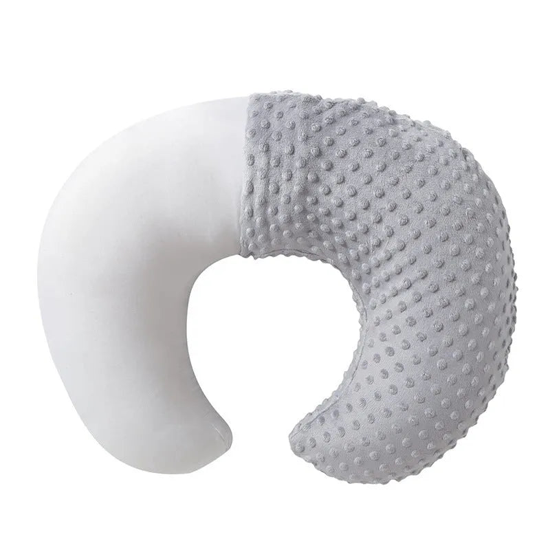 Grey nursing pillow with removable pillowcase for breastfeeding support and milk spill prevention