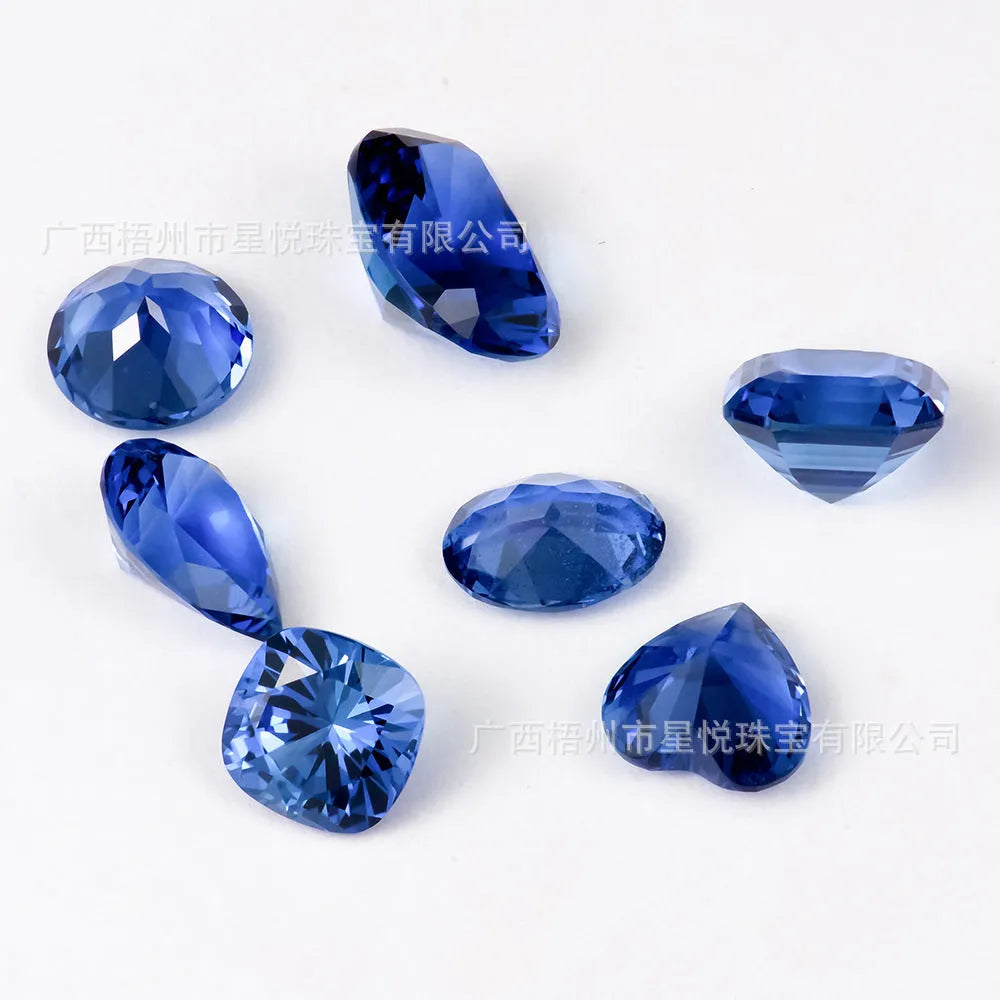 Royal blue synthetic gemstone showing heart, round, and pear cut shapes for jewellery making