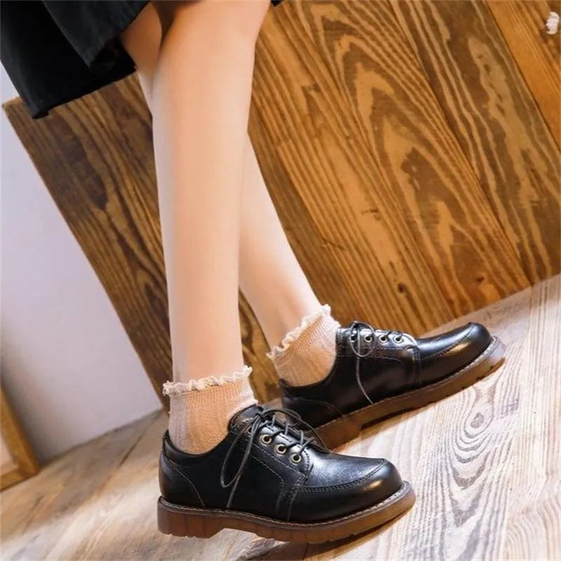 Women's black retro Mary Jane shoes with front lace-up and low square heel