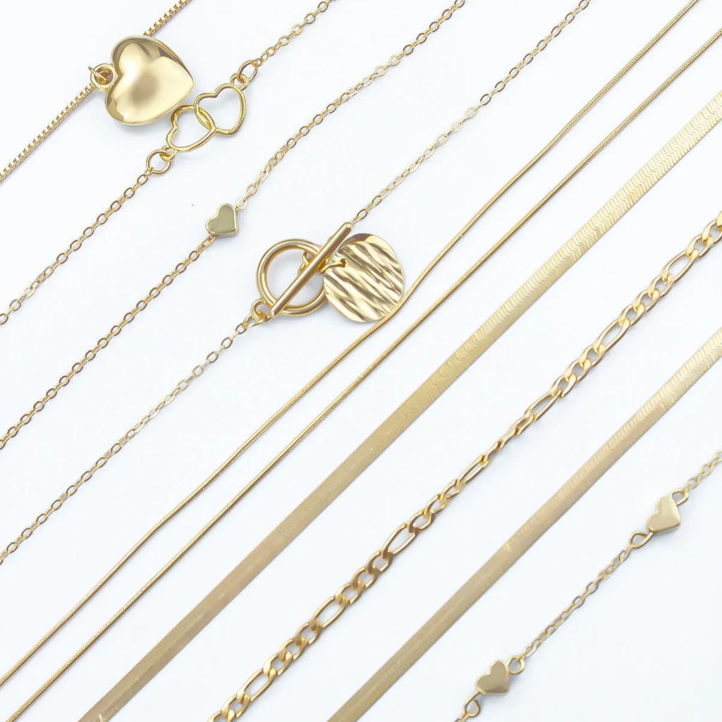 10-piece gold electroplated women's necklace set with snake bone chains and simple alloy pendants