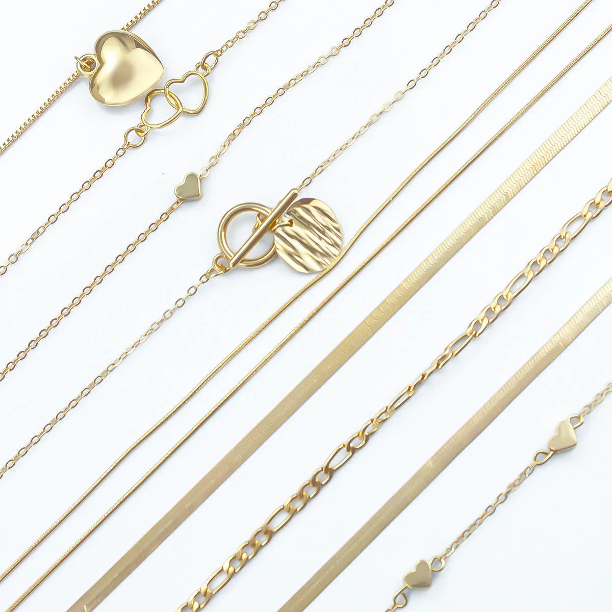 10-piece gold electroplated women's necklace set with snake bone chains and simple alloy pendants