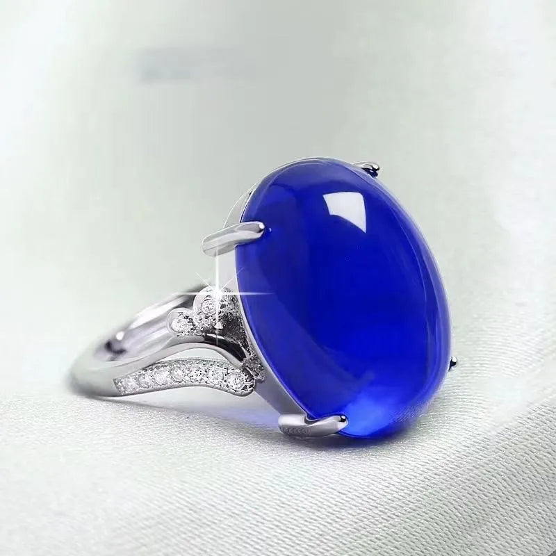 Geometric-style adjustable alloy ring in five colour options on a neutral background.