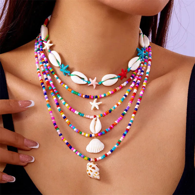 Women's 5-piece shell bead necklace set with starfish pendants and adjustable length