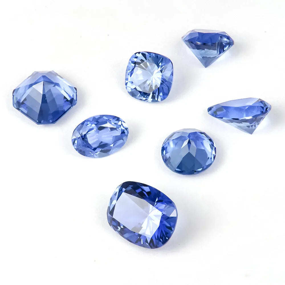 Royal blue synthetic gemstone showing heart, round, and pear cut shapes for jewellery making