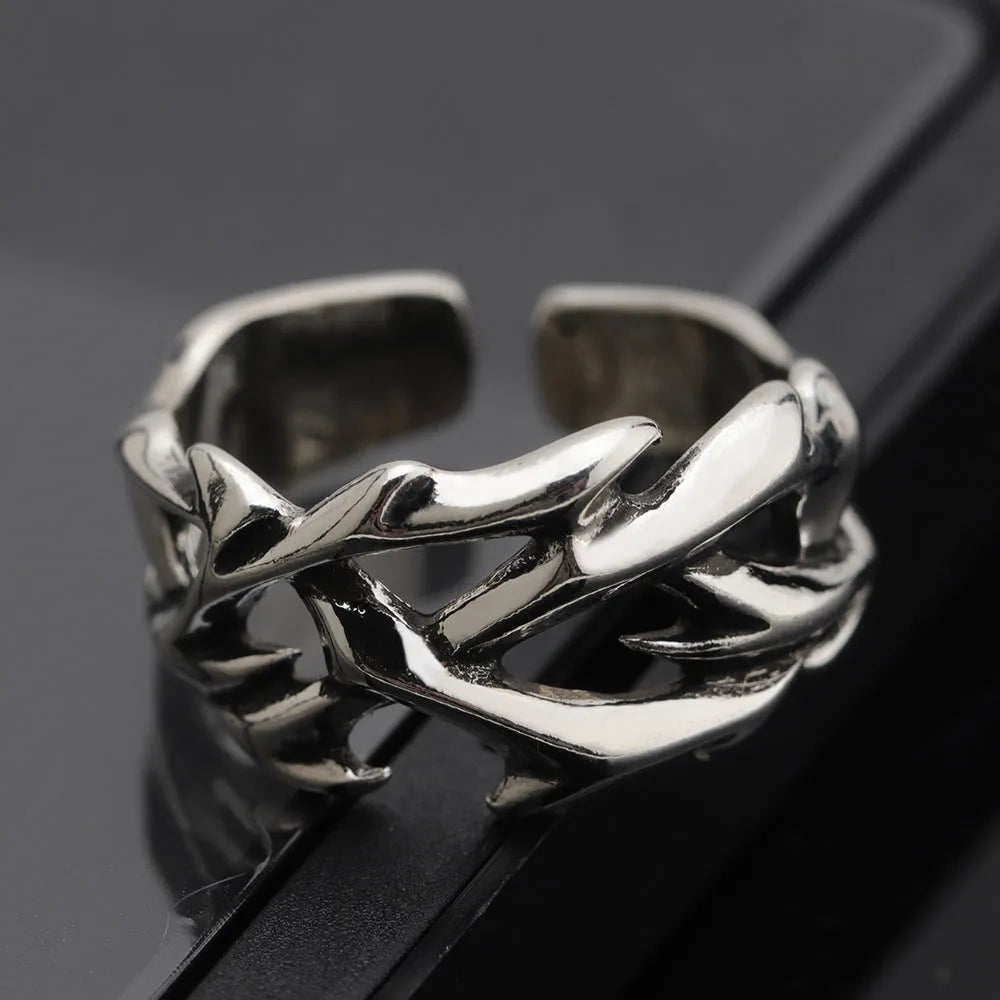 Adjustable copper ring with geometric thorn and flower design in J2150 thorns colour