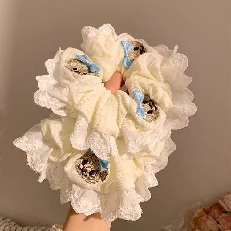 Bear blue bow lace large intestine hair ring on white background
