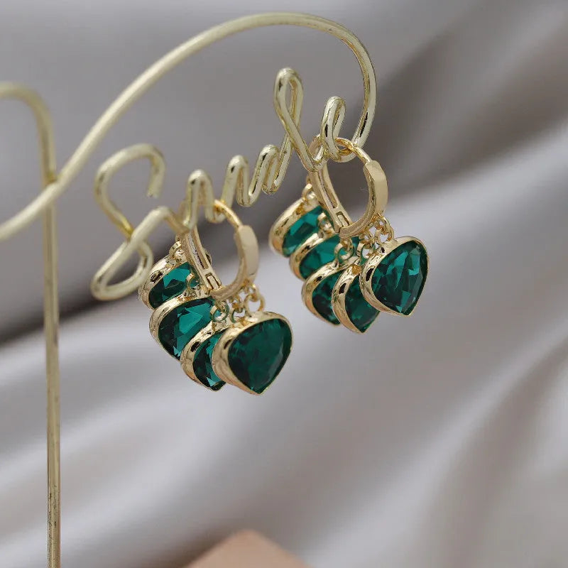 Green heart-shaped glass pendant ear clips with Korean style design and alloy gemstone details