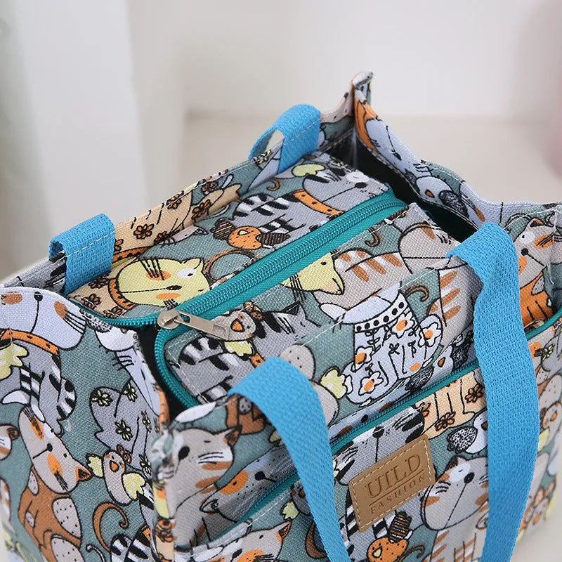 Women's printed canvas bag with aluminium frame in floral pattern and colour variations