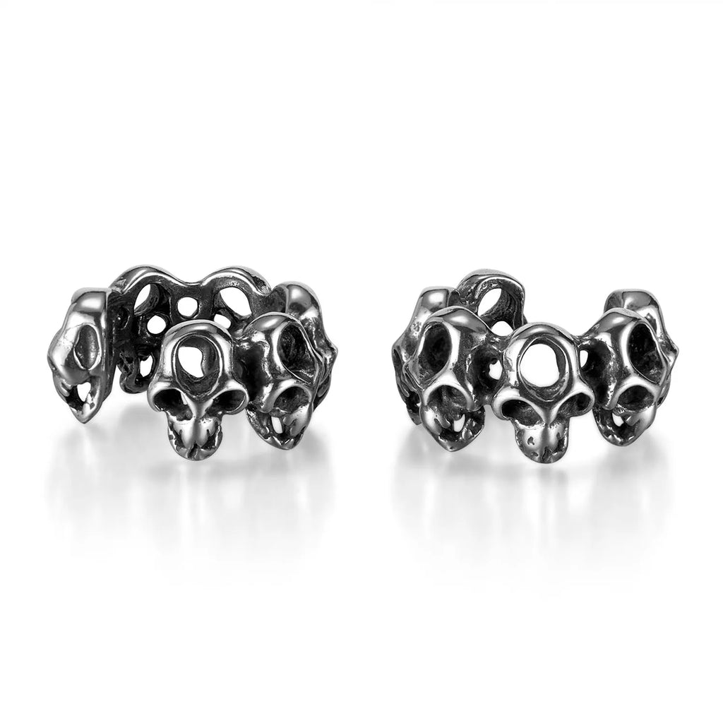 Stainless steel skull earrings with clip-on fastening and hollow geometric design