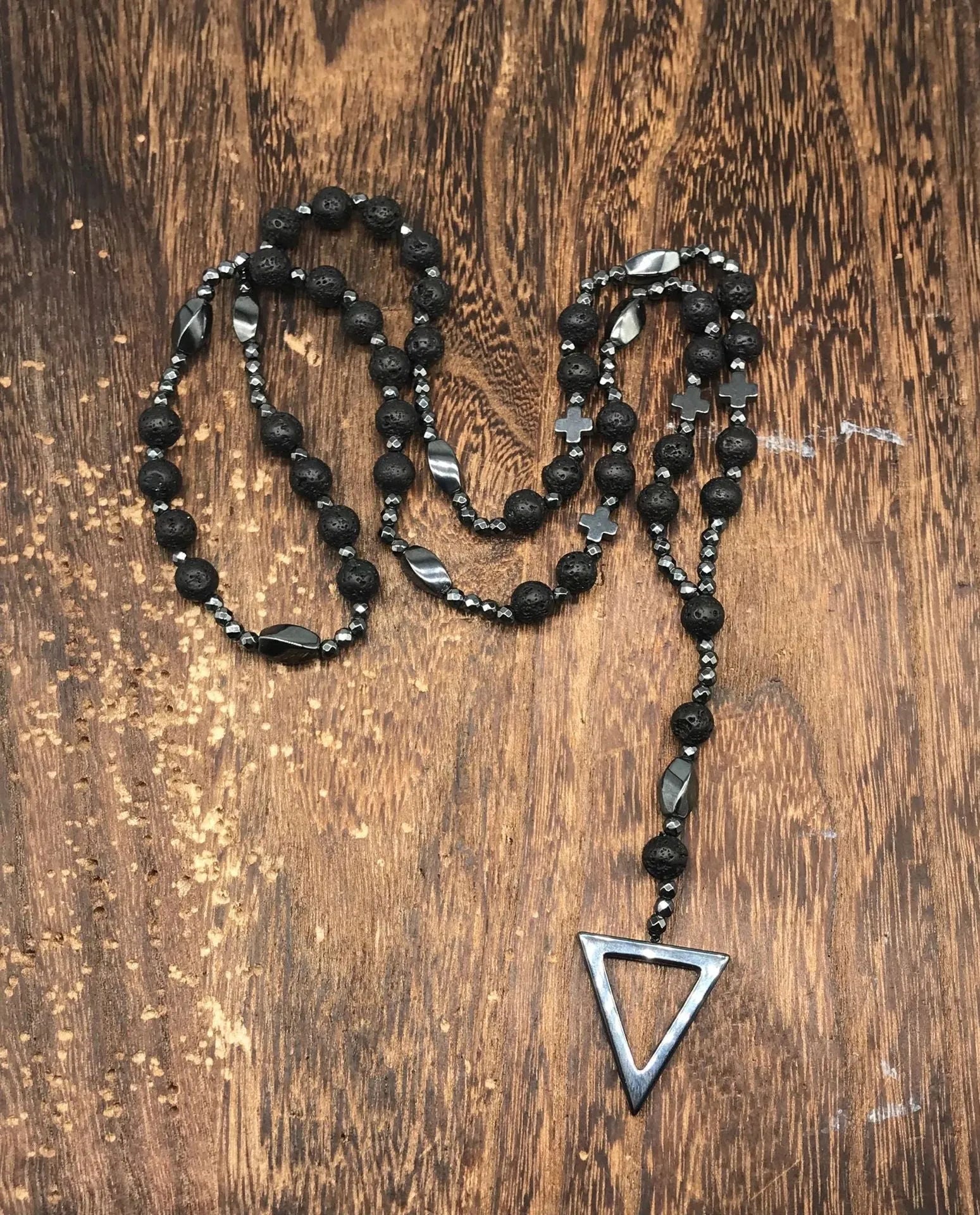 Men's stone cross pendant necklace on a ball bead chain with a safety lock clasp.