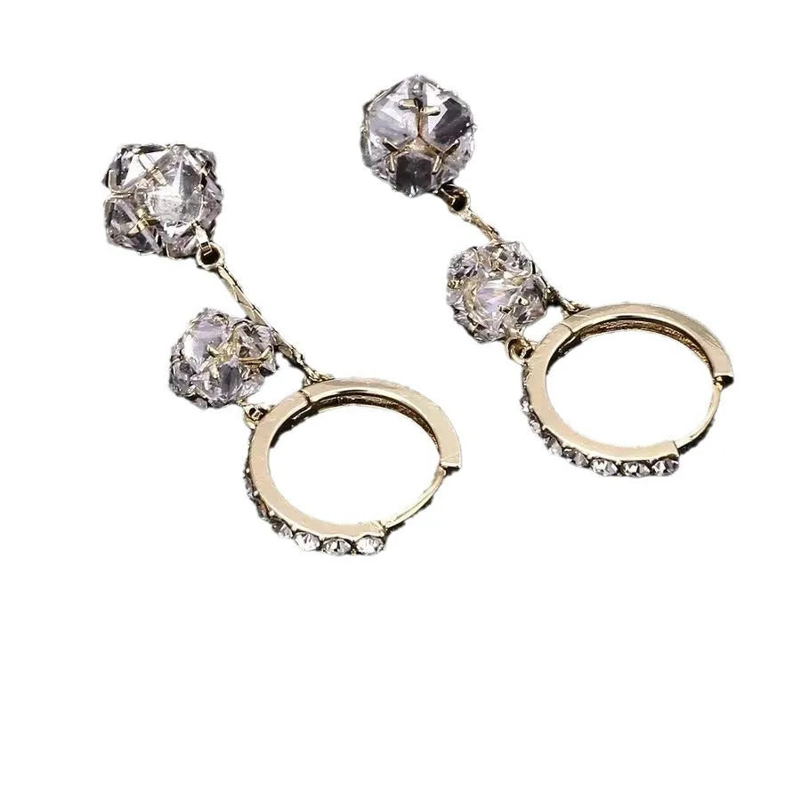 Silver confession balloon drop earrings with rhinestone ball and tassel pendant details and clip fastening