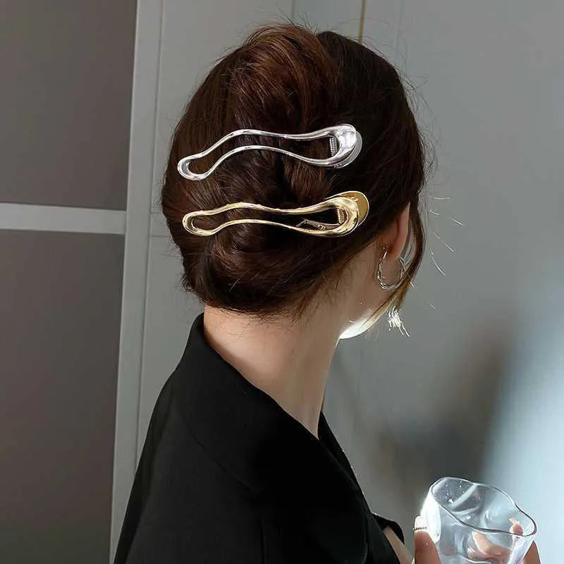 Women's zinc alloy hair barrettes in gold and silver with square, arc and triangle shapes