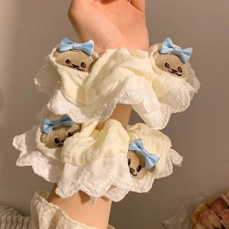 Bear blue bow lace large intestine hair ring on white background