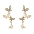 Gold-coloured copper earrings with butterfly design in ear drop style for women