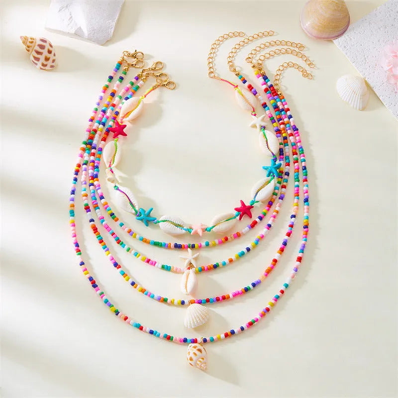 Women's 5-piece shell bead necklace set with starfish pendants and adjustable length